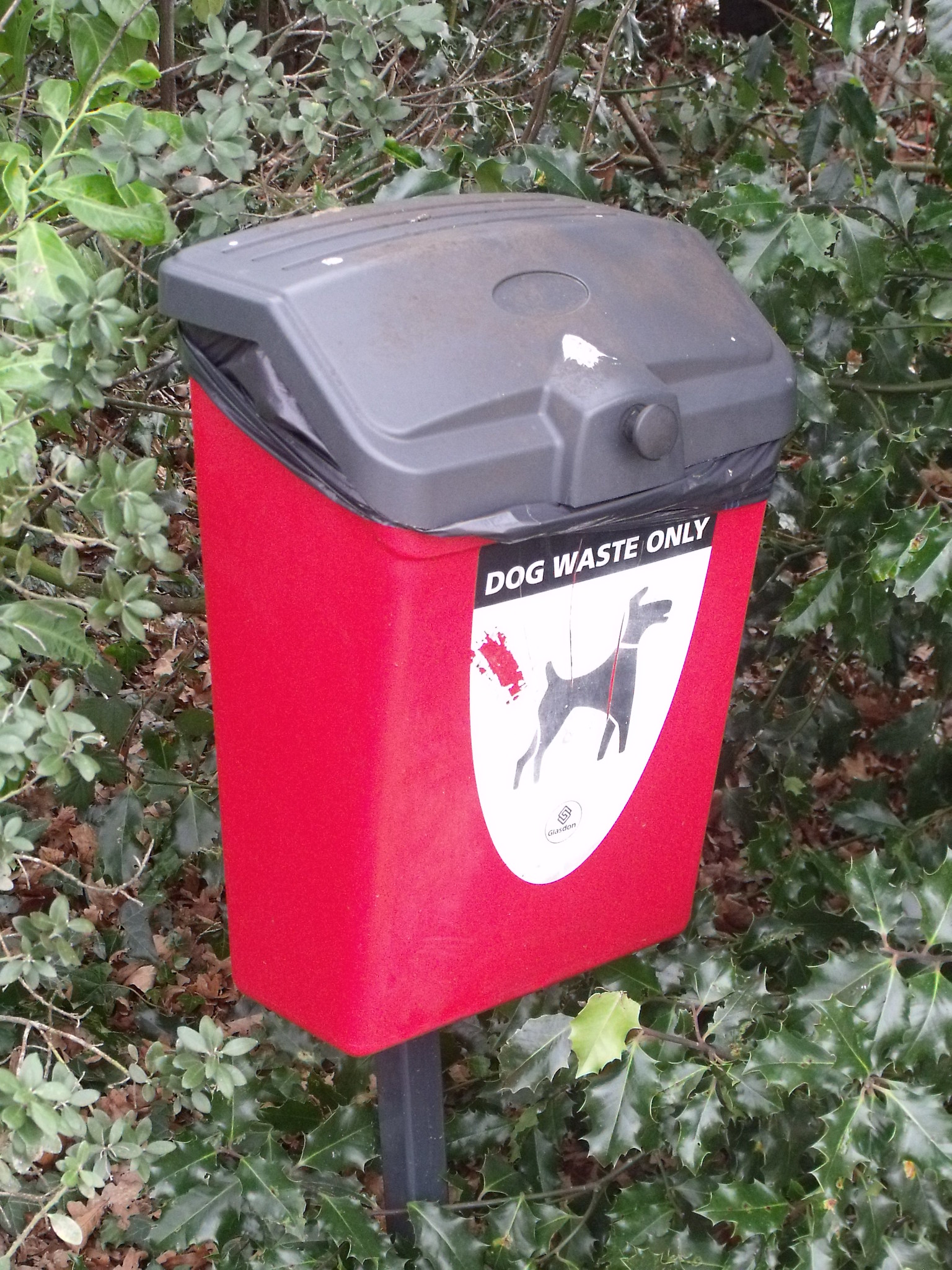 Dog waste bin in red